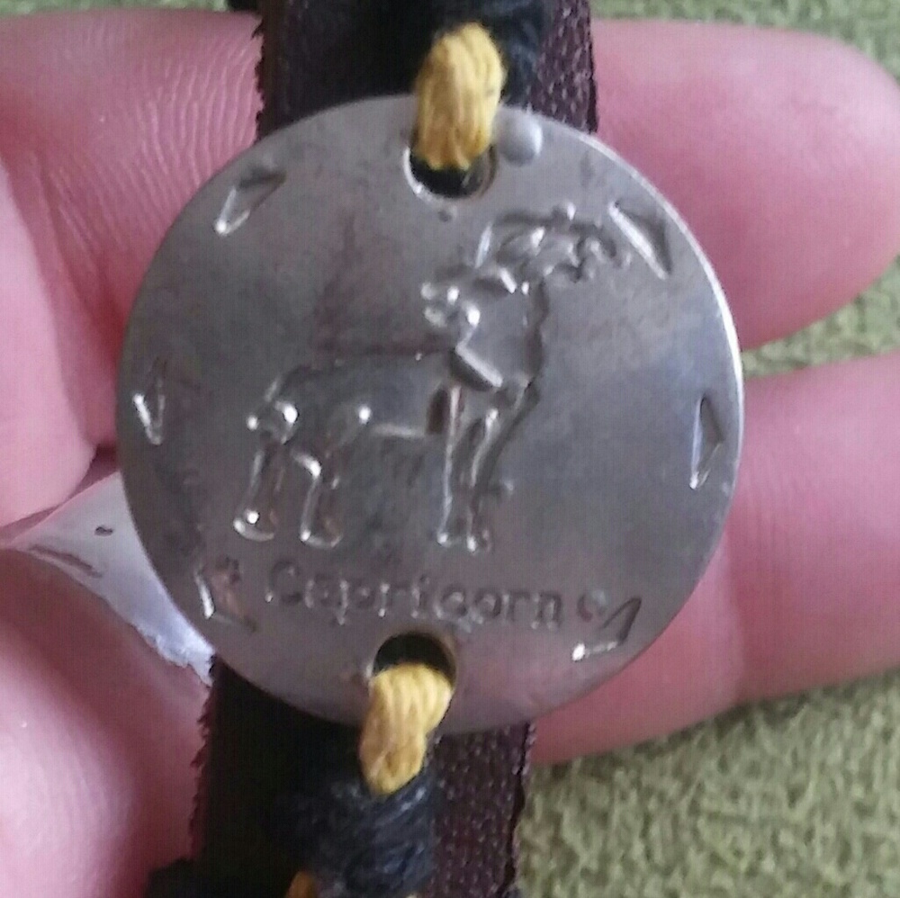 *Capricorn* bracelets 1 gold 1 silver